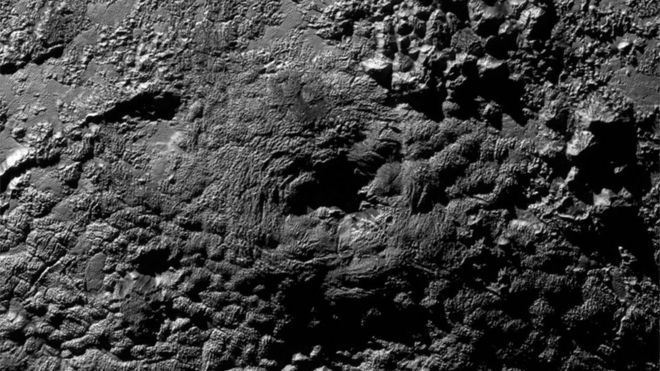 Wright Mons is located south of Sputnik Planum on Pluto