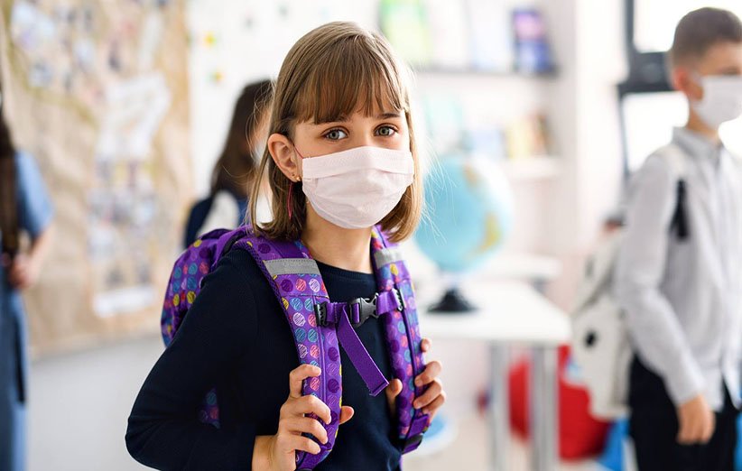 کودکان در برابر کرونا و آنفولانزا در مدرسه