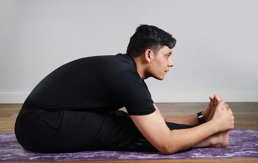 «خم شدن به جلو نشسته» (Seated Forward Fold)