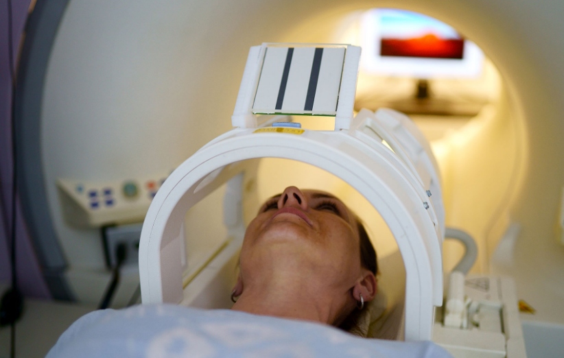 inside tube of mri scanner women