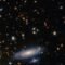 نگاه تلسکوپ جیمز وب به کهکشان مارپیچی LEDA 2046648